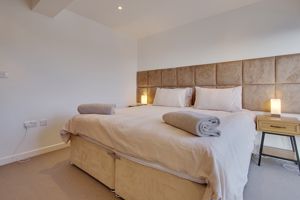 Bedroom One- click for photo gallery
